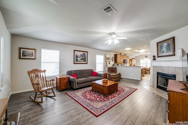 703 Point Spgs, San Antonio, TX 78253 - living area featuring wood finished floors, a ceiling fan, vaulted ceiling, and baseboards