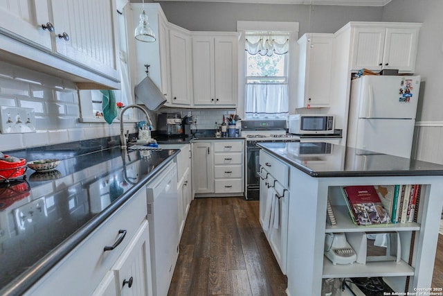 225 W Humphreys, Seguin, TX 78155 - kitchen featuring white appliances, open shelves, white cabinets, dark wood finished floors, and a chandelier