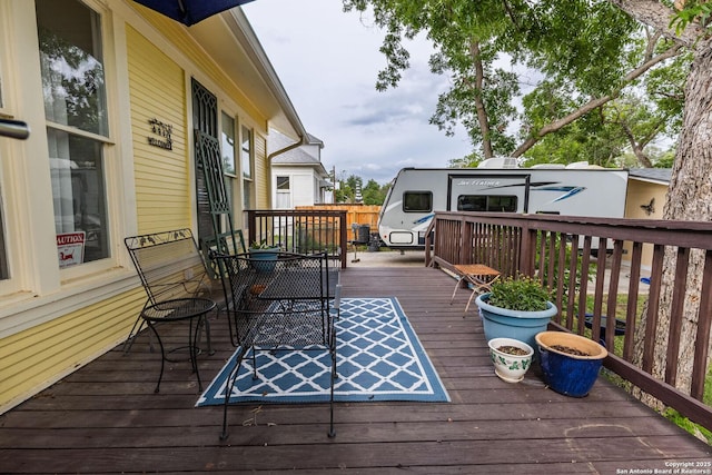 225 W Humphreys, Seguin, TX 78155 - wooden deck with outdoor dining area