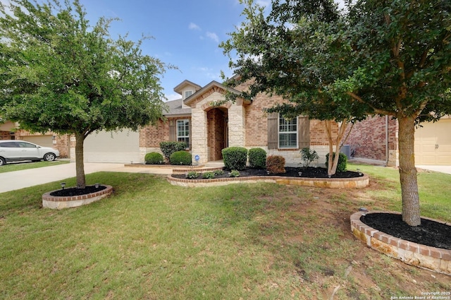 8530 Briscoe Flds, San Antonio, TX 78254 - view of property hidden behind natural elements featuring concrete driveway, brick siding, an attached garage, stone siding, and a front yard
