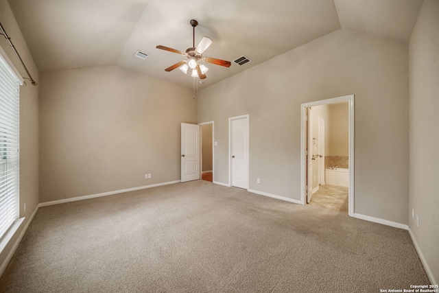 7459 Eagle Ledge, San Antonio, TX 78249 - unfurnished bedroom with vaulted ceiling, carpet floors, baseboards, connected bathroom, and a ceiling fan