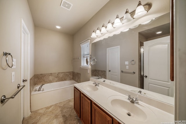 7459 Eagle Ledge, San Antonio, TX 78249 - bathroom featuring a bath and double vanity