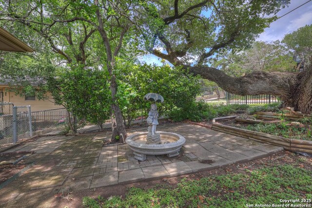 821 Lakeview, Canyon Lake, TX 78133 - fenced backyard featuring a patio area
