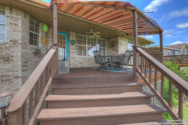 821 Lakeview, Canyon Lake, TX 78133 - deck featuring ceiling fan and outdoor dining space