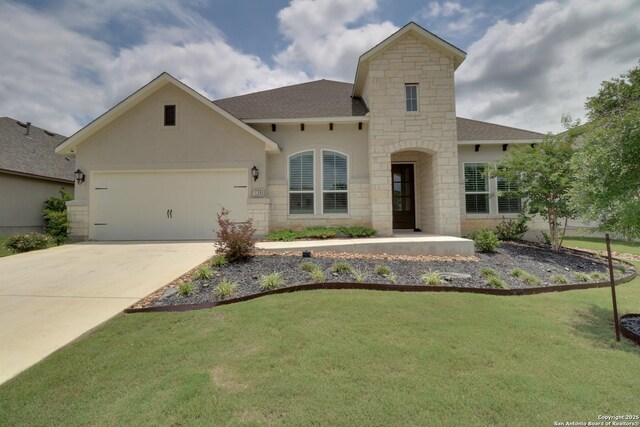 128 Maravillas, Boerne, TX 78006 - french provincial home with stone siding, a shingled roof, a front yard, an attached garage, and driveway