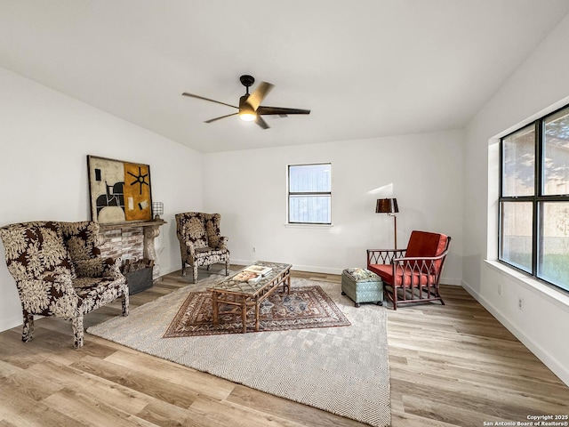 1412 Laurie, Canyon Lake, TX 78133 - living area with light wood-style floors, ceiling fan, baseboards, and lofted ceiling