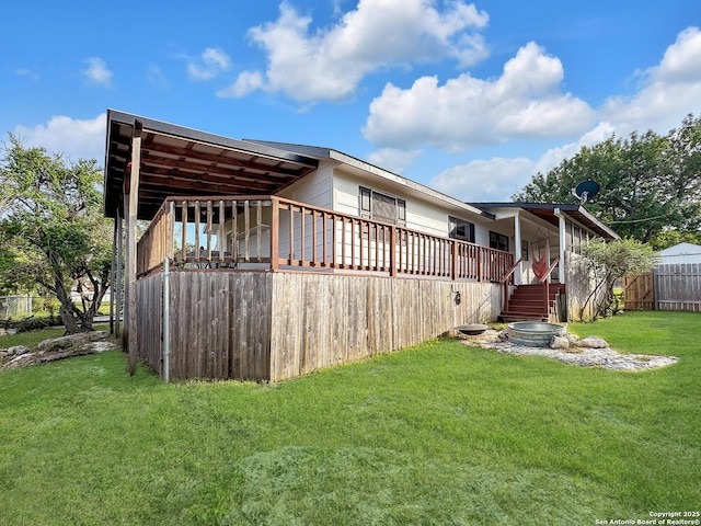1412 Laurie, Canyon Lake, TX 78133 - rear view of house with a deck and stairs
