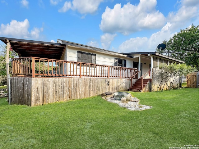 1412 Laurie, Canyon Lake, TX 78133 - back of property with a deck and a yard