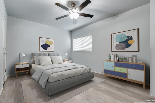 10442 Macarthur, Converse, TX 78109 - bedroom with light wood finished floors, baseboards, and ceiling fan