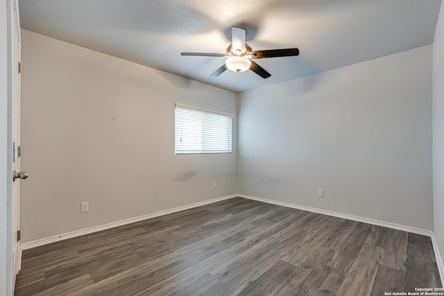 10442 Macarthur, Converse, TX 78109 - empty room with a ceiling fan, dark wood finished floors, and baseboards