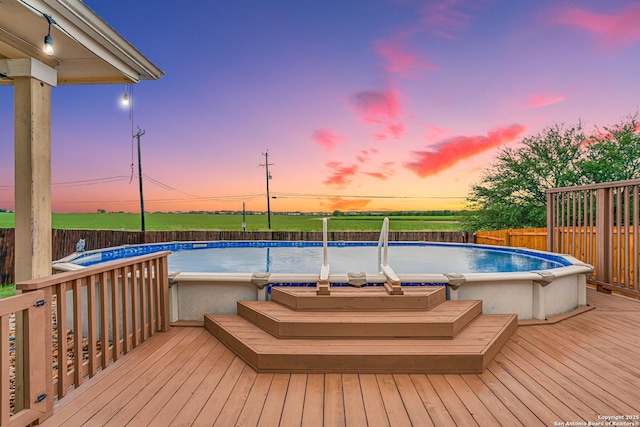 10442 Macarthur, Converse, TX 78109 - pool at dusk with a deck and a fenced backyard