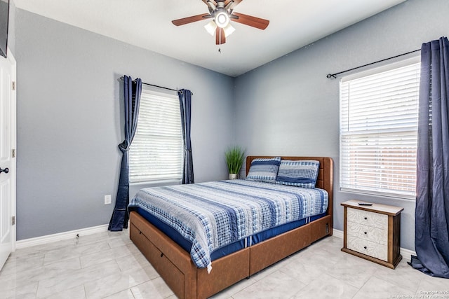 5722 Pioneer Rdg, San Antonio, TX 78245 - bedroom featuring baseboards and ceiling fan