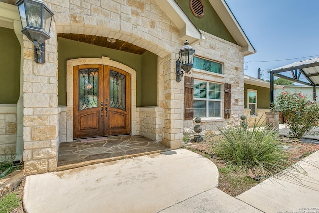 5722 Pioneer Rdg, San Antonio, TX 78245 - entrance to property with stone siding and french doors