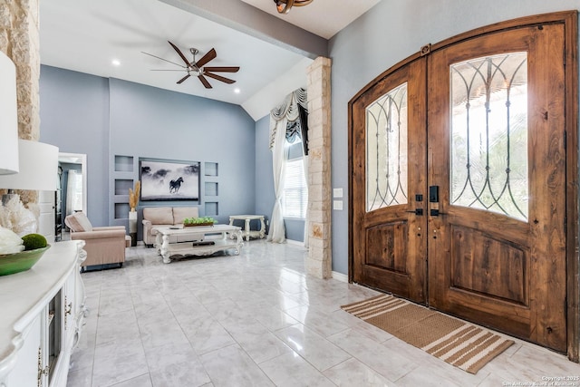 5722 Pioneer Rdg, San Antonio, TX 78245 - foyer featuring ceiling fan, vaulted ceiling, light marble finish flooring, french doors, and baseboards