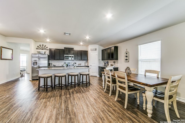7610 Eclipse Mark, San Antonio, TX 78252 - dining area with dark wood-style flooring, baseboards, and recessed lighting