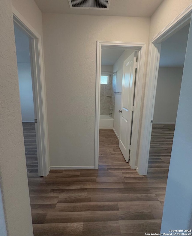 15302 Smoky Honeyeater, San Antonio, TX 78253 - hall featuring wood finished floors and baseboards