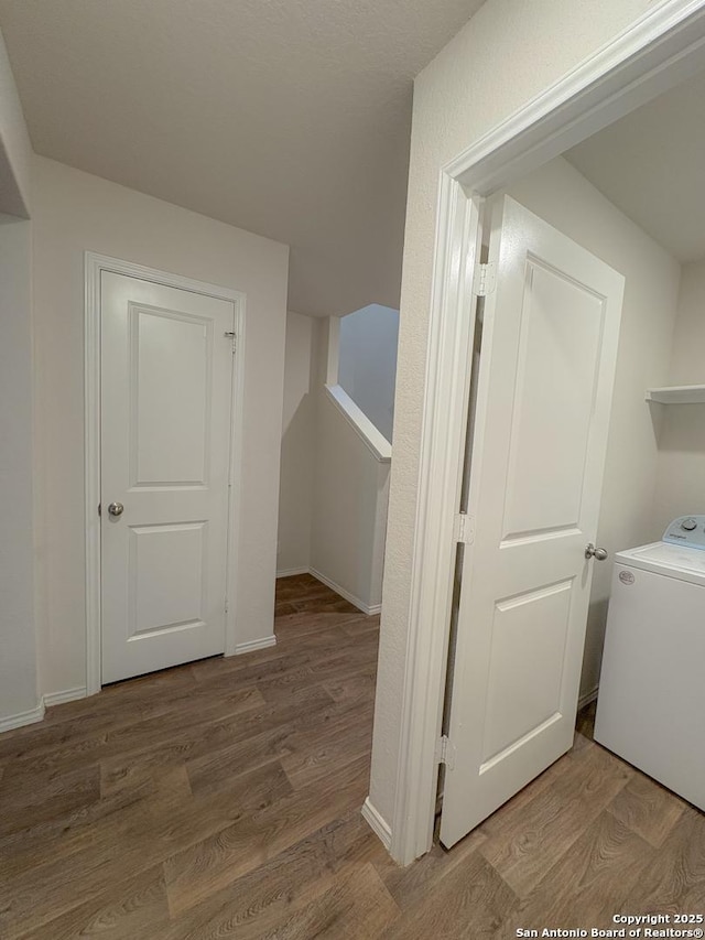 15302 Smoky Honeyeater, San Antonio, TX 78253 - washroom featuring washer / dryer, wood finished floors, and baseboards