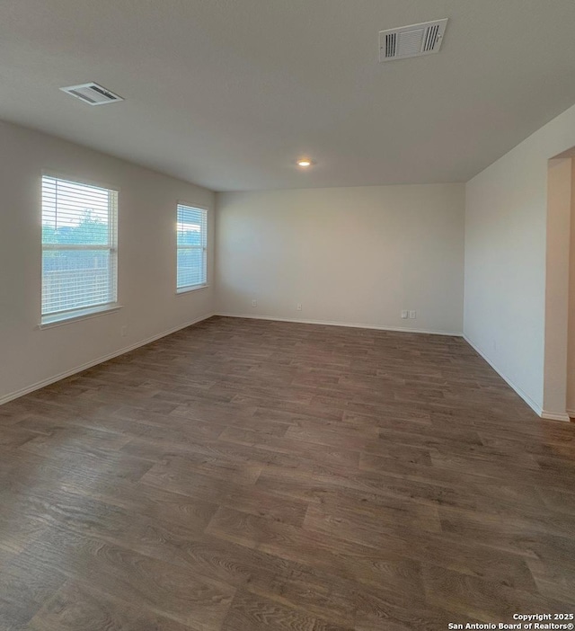 15302 Smoky Honeyeater, San Antonio, TX 78253 - unfurnished room featuring wood finished floors, baseboards, and recessed lighting