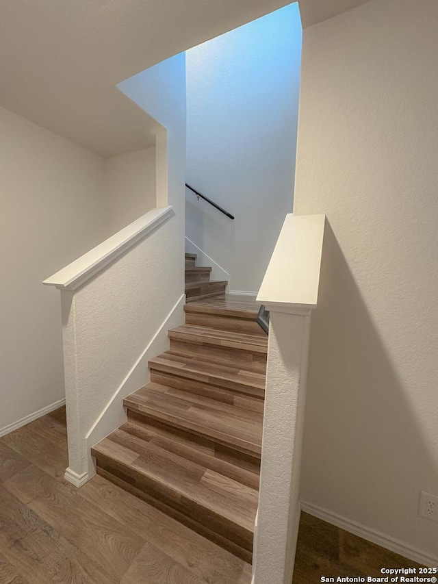15302 Smoky Honeyeater, San Antonio, TX 78253 - stairway with wood finished floors and baseboards