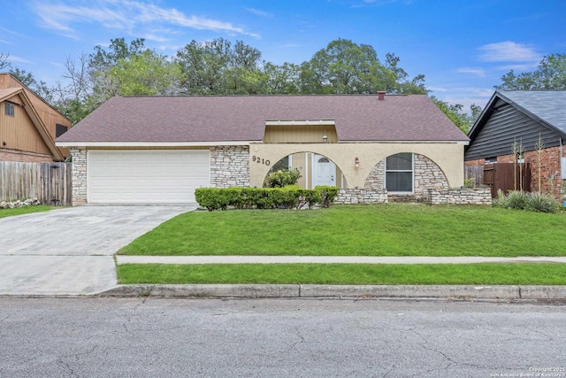 9210 Overton, San Antonio, TX 78217 - view of front of home with stone siding, concrete driveway, and an attached garage