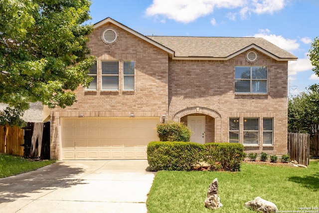 1339 Pecan Sta, San Antonio, TX 78258 - view of front of house featuring brick siding, driveway, a garage, and roof with shingles