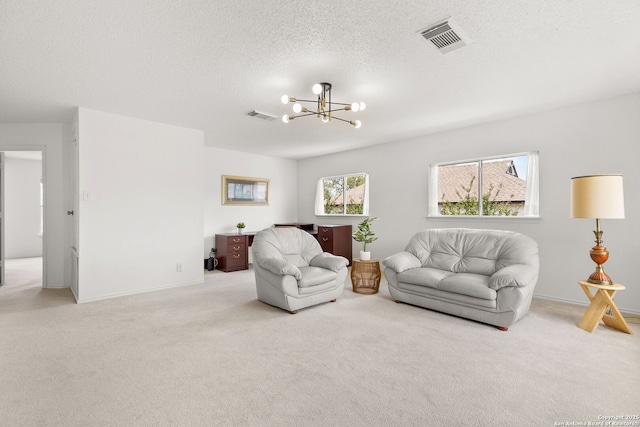 1339 Pecan Sta, San Antonio, TX 78258 - living area featuring carpet flooring, a chandelier, and a textured ceiling