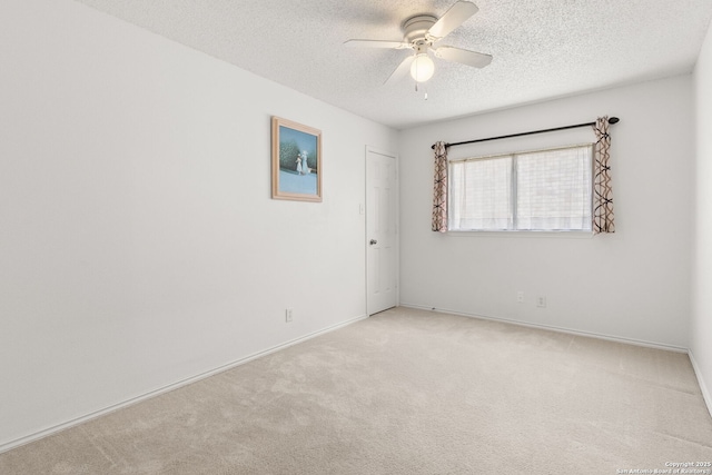 1339 Pecan Sta, San Antonio, TX 78258 - carpeted empty room featuring a ceiling fan, a textured ceiling, and baseboards