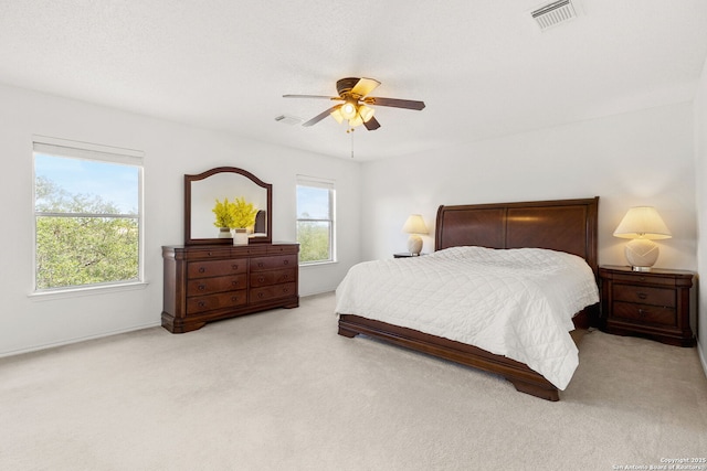 1339 Pecan Sta, San Antonio, TX 78258 - carpeted bedroom with ceiling fan and baseboards