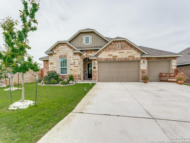 5344 Jasmine, Bulverde, TX 78163 - view of front facade featuring board and batten siding, a front lawn, a garage, driveway, and stone siding