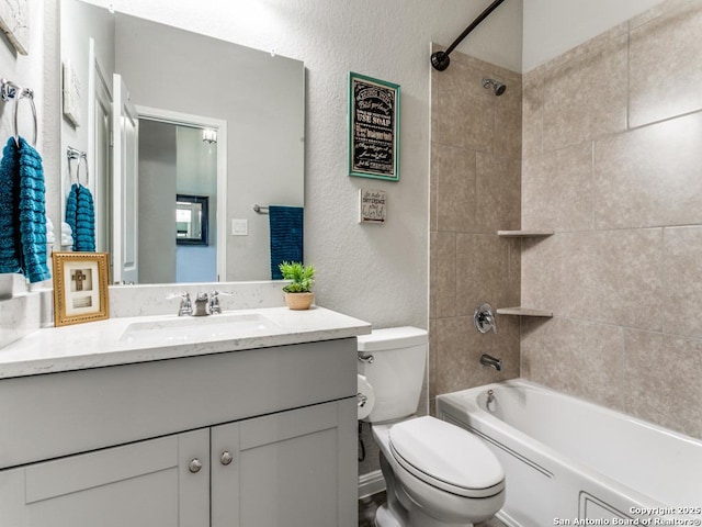 5344 Jasmine, Bulverde, TX 78163 - full bathroom with toilet, vanity, tub / shower combination, and a textured wall