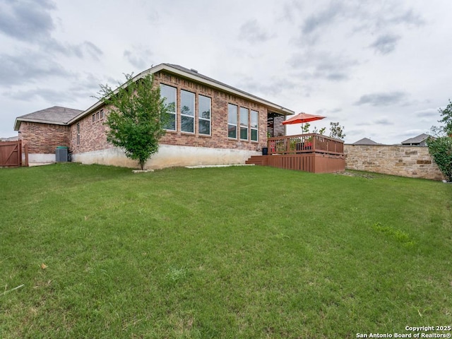 5344 Jasmine, Bulverde, TX 78163 - back of property featuring a deck, cooling unit, and brick siding