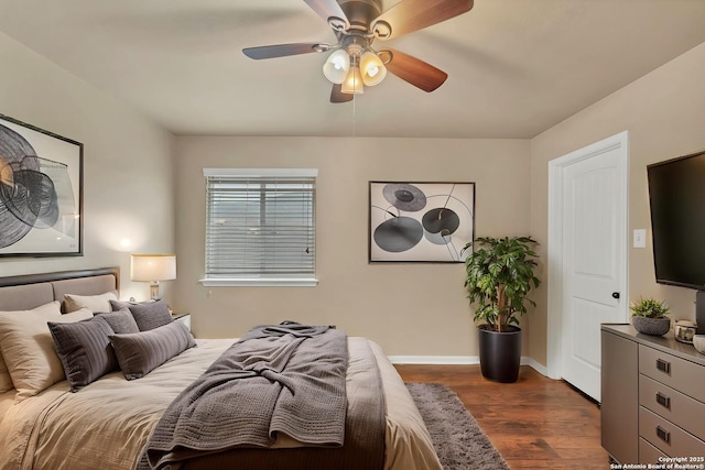 267 Oak Crk, New Braunfels, TX 78130 - bedroom with dark wood-style flooring, baseboards, and ceiling fan