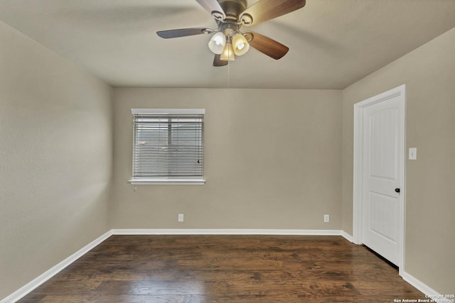 267 Oak Crk, New Braunfels, TX 78130 - spare room featuring dark wood-style floors, a ceiling fan, and baseboards