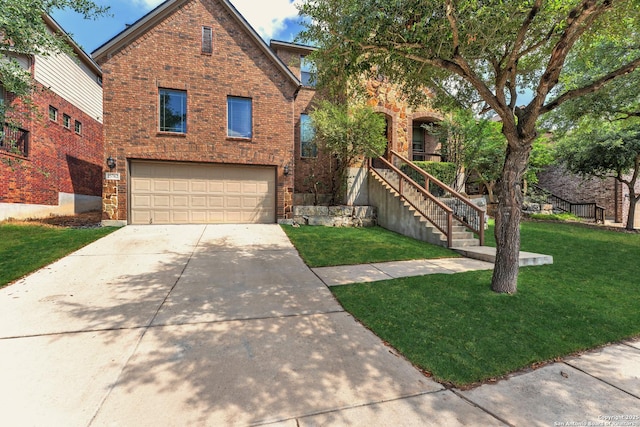 25702 Willard Path, San Antonio, TX 78261 - view of front of property with brick siding, an attached garage, driveway, and a front yard