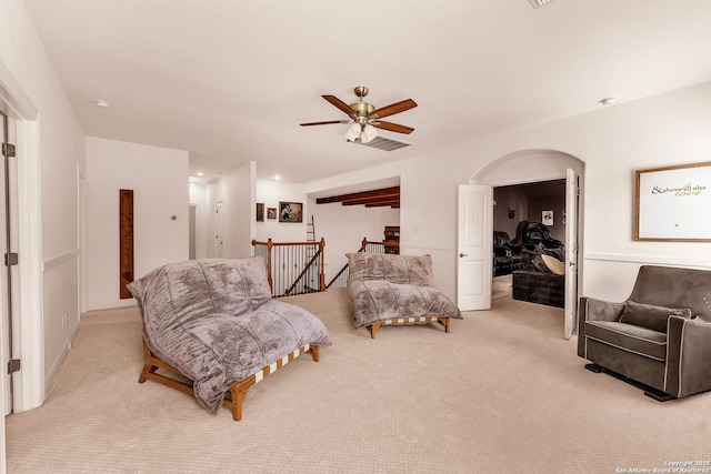 25702 Willard Path, San Antonio, TX 78261 - living room featuring light colored carpet, ceiling fan, and arched walkways
