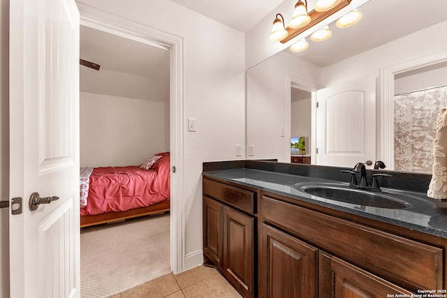 25702 Willard Path, San Antonio, TX 78261 - bathroom featuring vanity, connected bathroom, tile patterned floors, and a chandelier