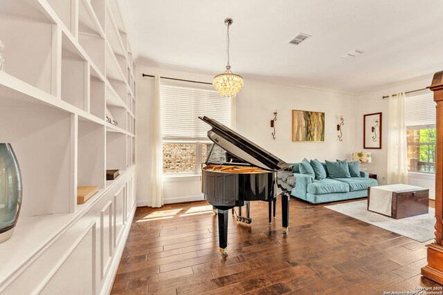 25702 Willard Path, San Antonio, TX 78261 - sitting room with hardwood / wood-style flooring, a chandelier, crown molding, and baseboards