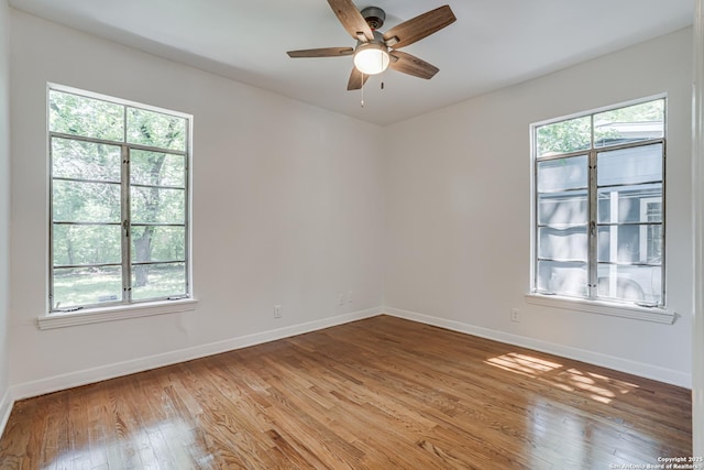 135 Englewood, San Antonio, TX 78213 - spare room with baseboards, light wood finished floors, and ceiling fan