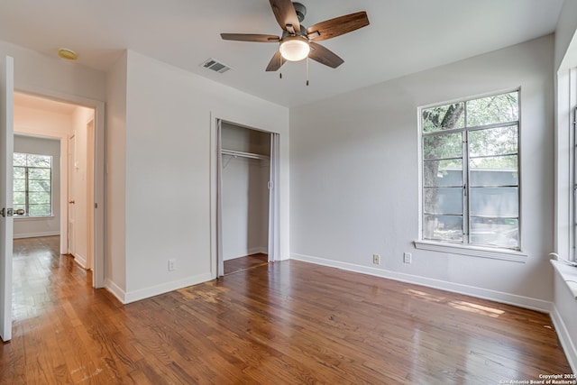 135 Englewood, San Antonio, TX 78213 - unfurnished bedroom with wood finished floors, a closet, and baseboards