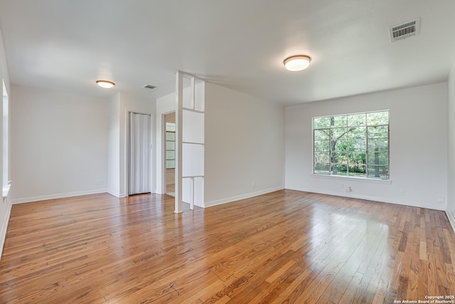 135 Englewood, San Antonio, TX 78213 - spare room featuring light wood-style floors and baseboards