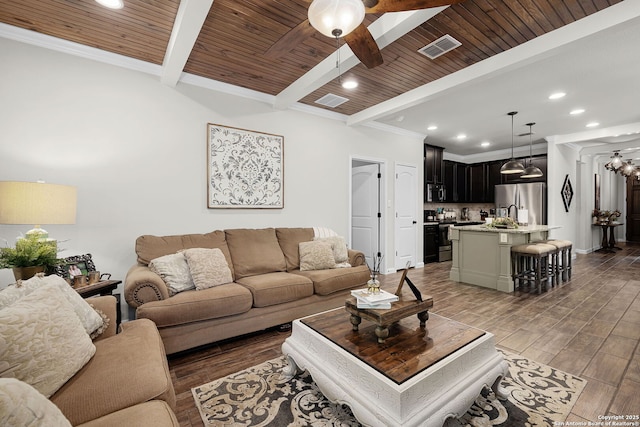 891 Noel, New Braunfels, TX 78130 - living room with ceiling fan, wooden ceiling with exposed beams, recessed lighting, light wood finished floors, and ornamental molding