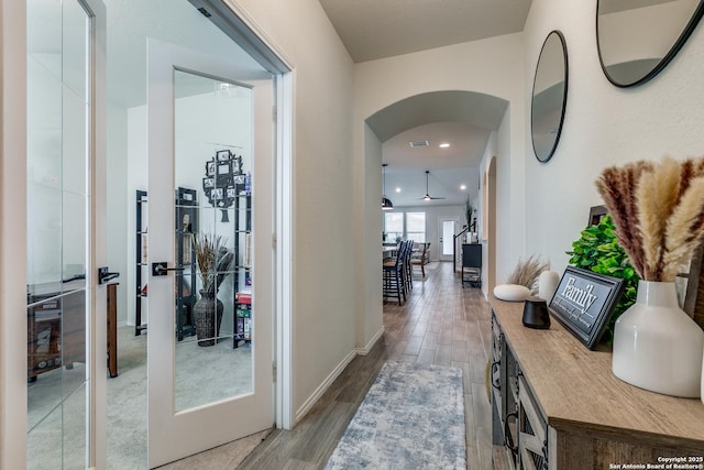 2103 Dalhart, San Antonio, TX 78253 - hall with arched walkways, wood finished floors, baseboards, and recessed lighting