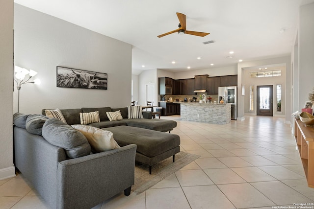 6239 Carriage Cpe, San Antonio, TX 78261 - living room with light tile patterned floors, a ceiling fan, and recessed lighting