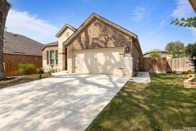 6239 Carriage Cpe, San Antonio, TX 78261 - view of front of property with a garage, concrete driveway, stone siding, and brick siding