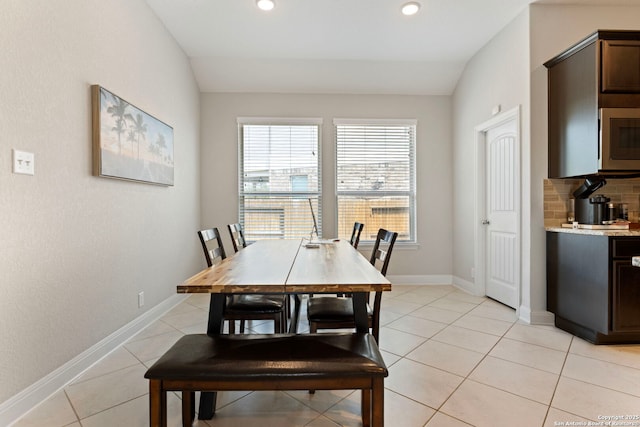 6239 Carriage Cpe, San Antonio, TX 78261 - dining space with vaulted ceiling, light tile patterned flooring, recessed lighting, and baseboards