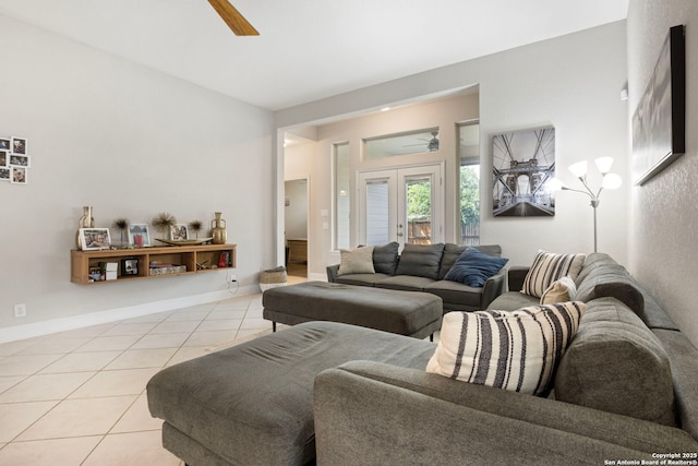 6239 Carriage Cpe, San Antonio, TX 78261 - living area featuring ceiling fan, light tile patterned floors, french doors, and baseboards