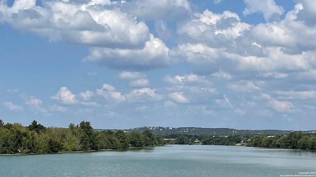 1006 Guadalupe St Unit 1B, Kerrville, TX 78028 - water view with a heavily wooded area