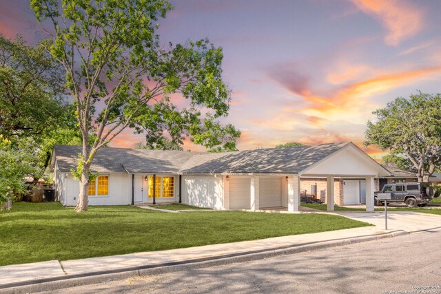 2723 Woodline, San Antonio, TX 78251 - single story home with driveway, a front yard, an attached garage, and a carport