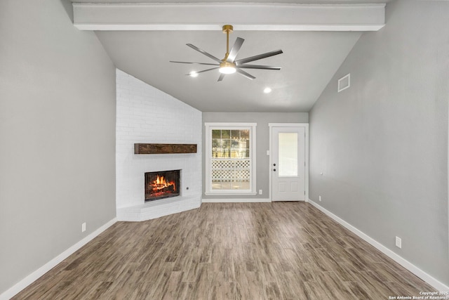 2723 Woodline, San Antonio, TX 78251 - unfurnished living room with a ceiling fan, a fireplace, baseboards, and wood finished floors