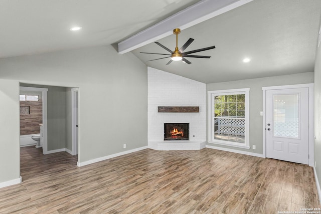2723 Woodline, San Antonio, TX 78251 - unfurnished living room with wood finished floors, ceiling fan, a fireplace, baseboards, and recessed lighting
